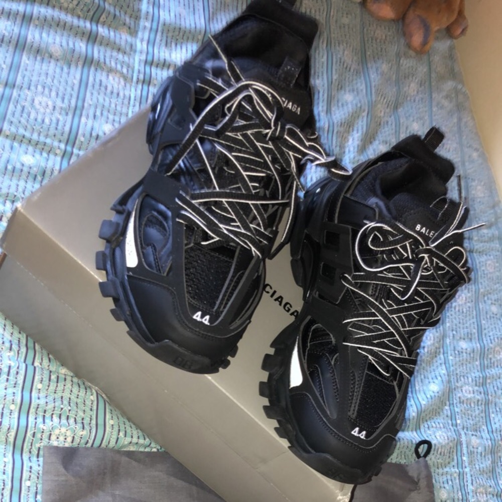 Black Balenciaga track sneakers.